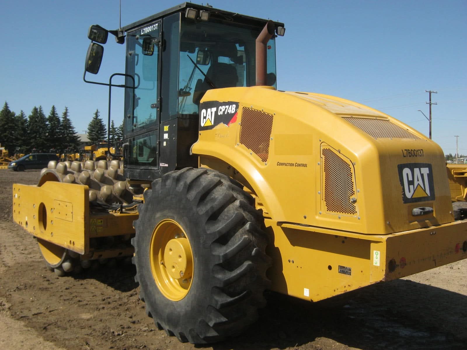 2015 Caterpillar CP74B Vibratory Single Drum Pad Compactor.